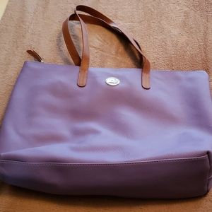 Pretty violet colored tote with accessories